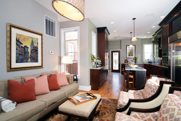 renovated kitchen flows into living area traditional design