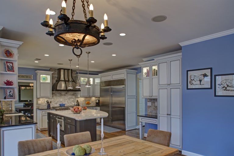 view into renovated traditional kitchen from dining room extra large stainless steel refrigerator center island