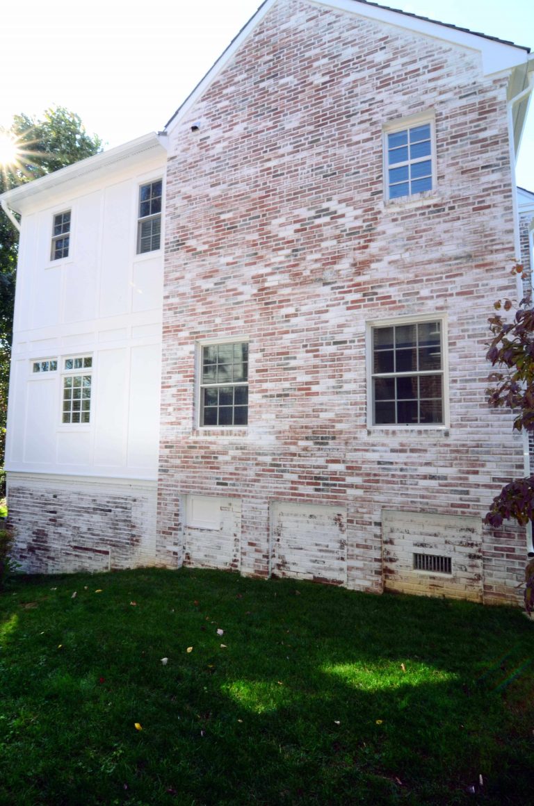 large addition on traditional brick virginia home