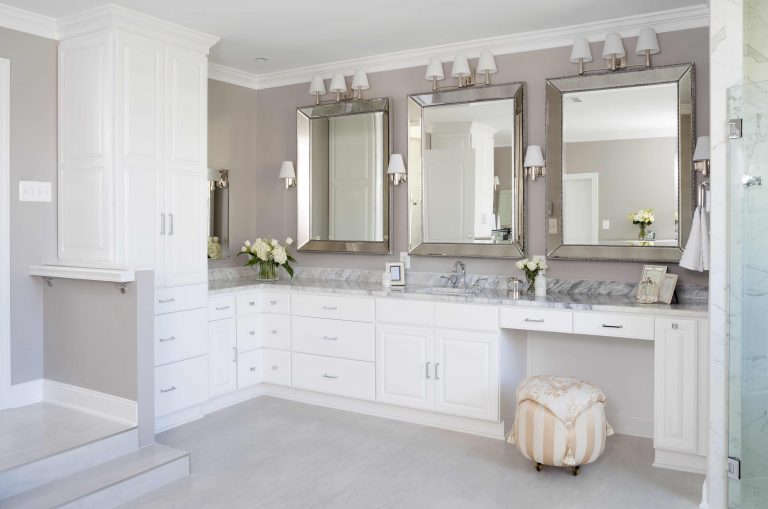 neutral palette renovated bathroom traditional style white cabinetry plenty of storage