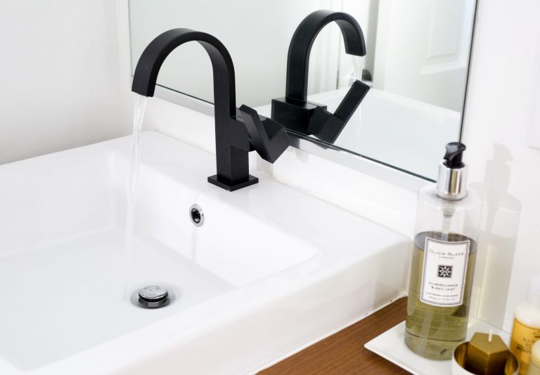 natural wood vanity modern style black fixtures