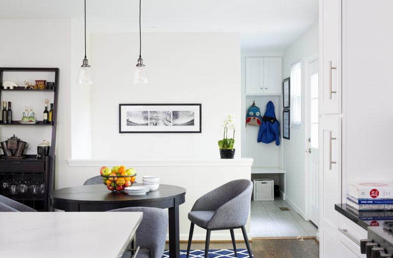 eat in area in kitchen with pendant lighting and view into mudroom