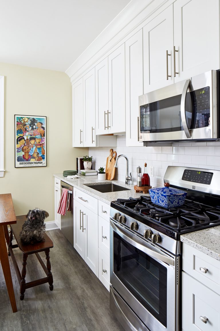 kitchen with white cabinetry and stainless steel appliances