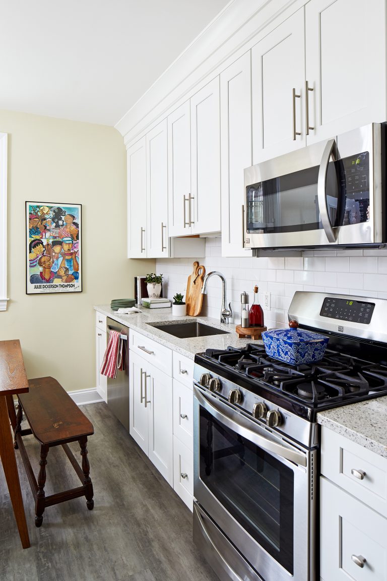 kitchen with white cabinetry and stainless steel appliances