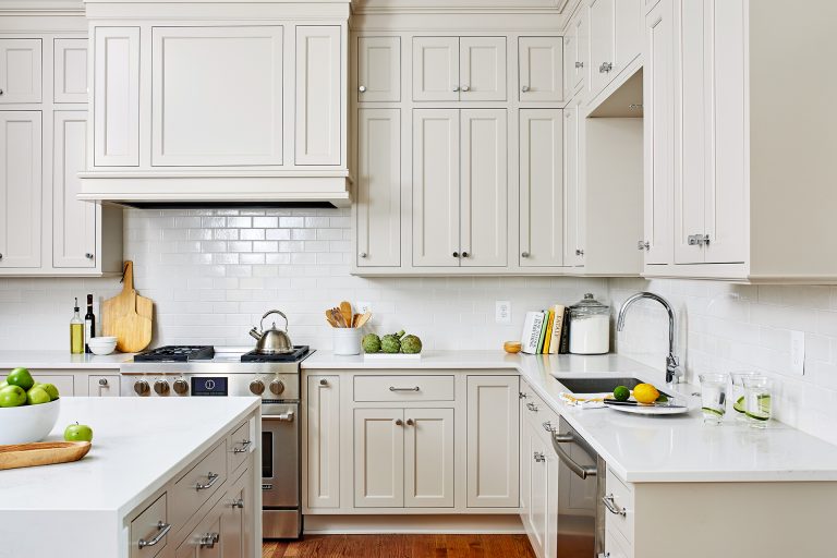 subway tile back splash, and waterfall edge island