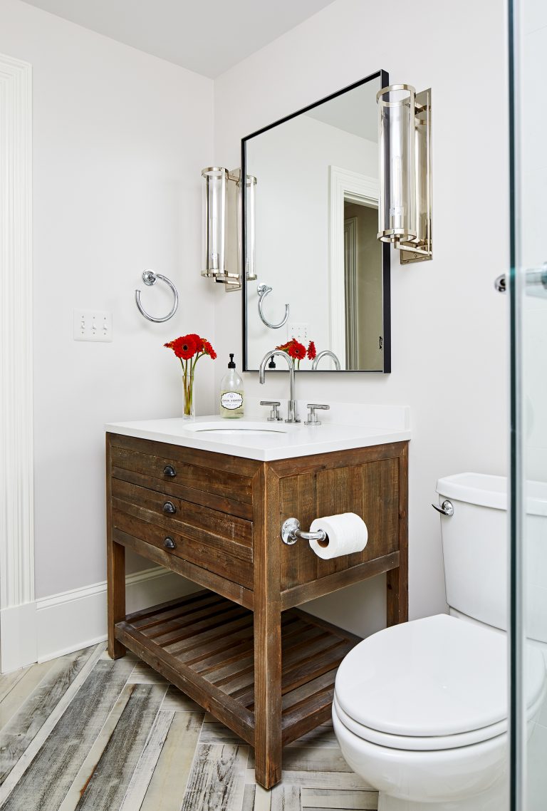 case remodeling bathroom with a farmhouse style rustic brown bathroom vanity