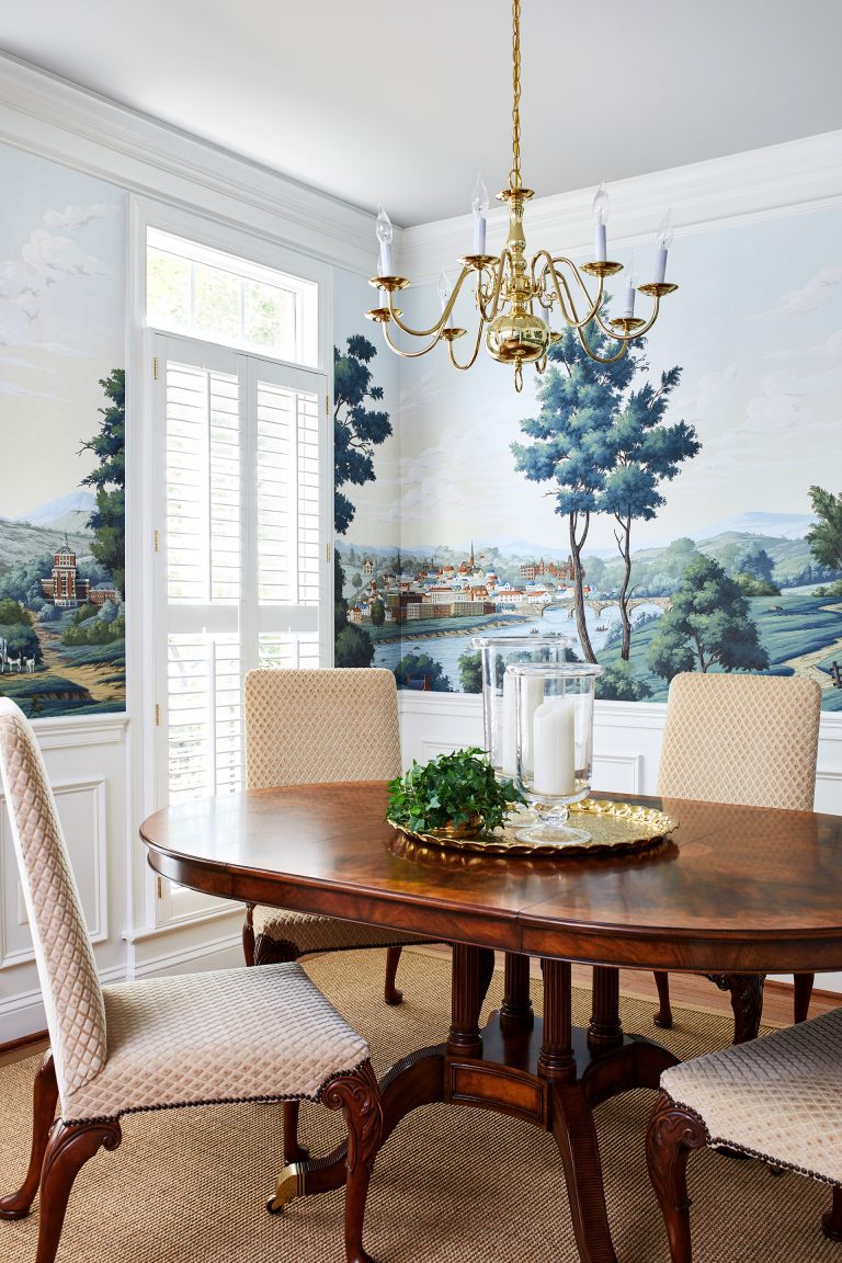 8 light Gold and Ivory Chandelier above wooded table