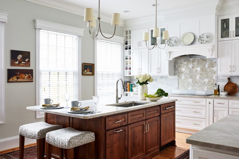 house design kitchen island facing large window with 2 chairs