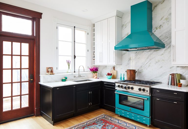 Black and white Kitchen with french doors and marble countertops