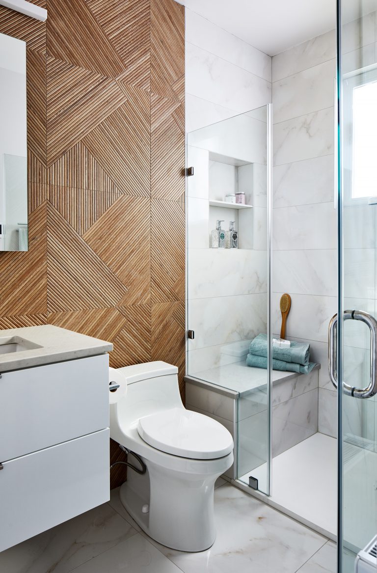 Washington dc remodeling contractor bathroom with floating shelf over the vanity and frameless glass shower