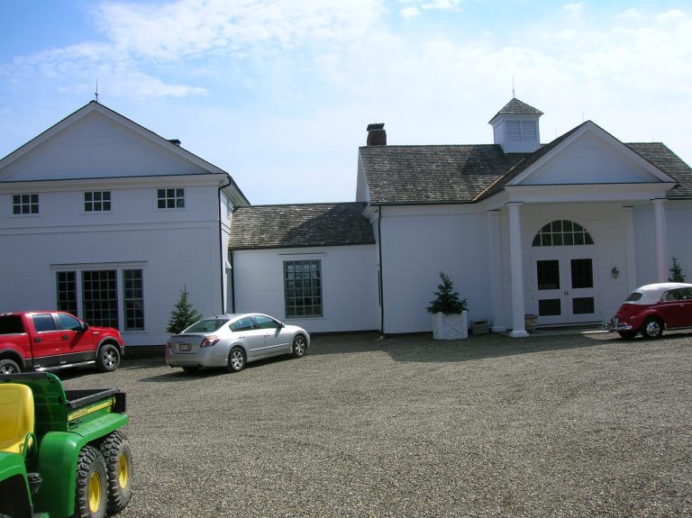 large driveway at back of house