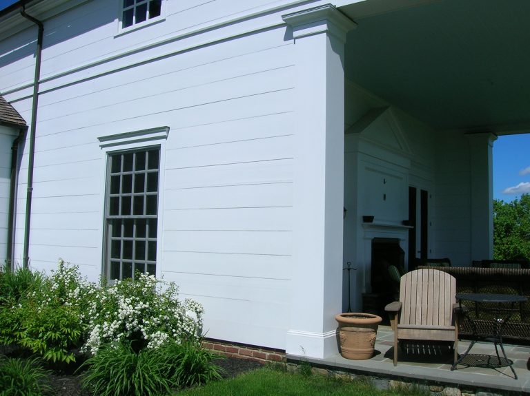 porch addition on home flagstone floor double glass doors into house