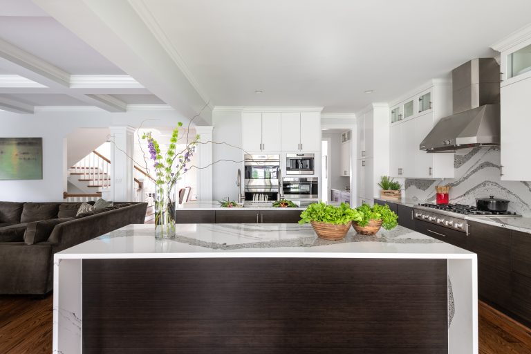 Brown and white kitchen island with matching cabinets